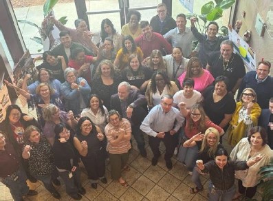 The Appreciative Inquiry process reinforced organization-wide commitment to inquiry, cross-departmental collaboration, and multi-stakeholder community engagement.